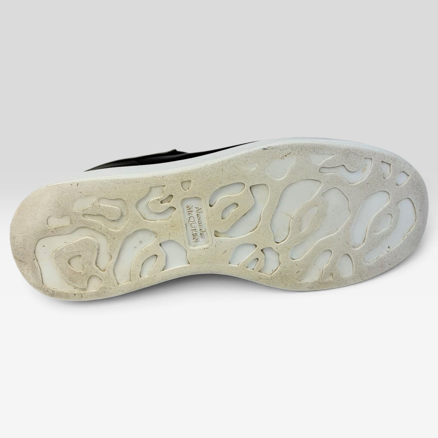 V STEALS Alexander McQueen oversized sneaker showing the white rubber outsole with embossed logo and unique tread