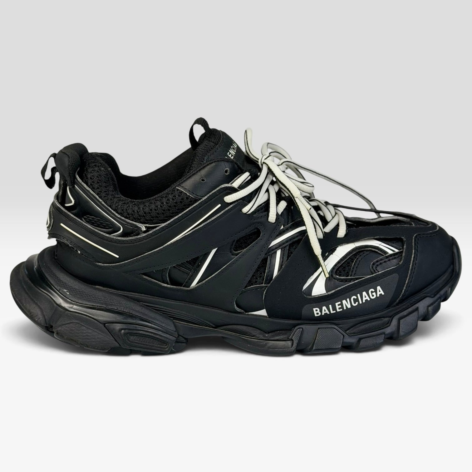 V STEALS Balenciaga Track sneakers in all black featuring technical mesh, multilayer caging, and a chunky lug sole.