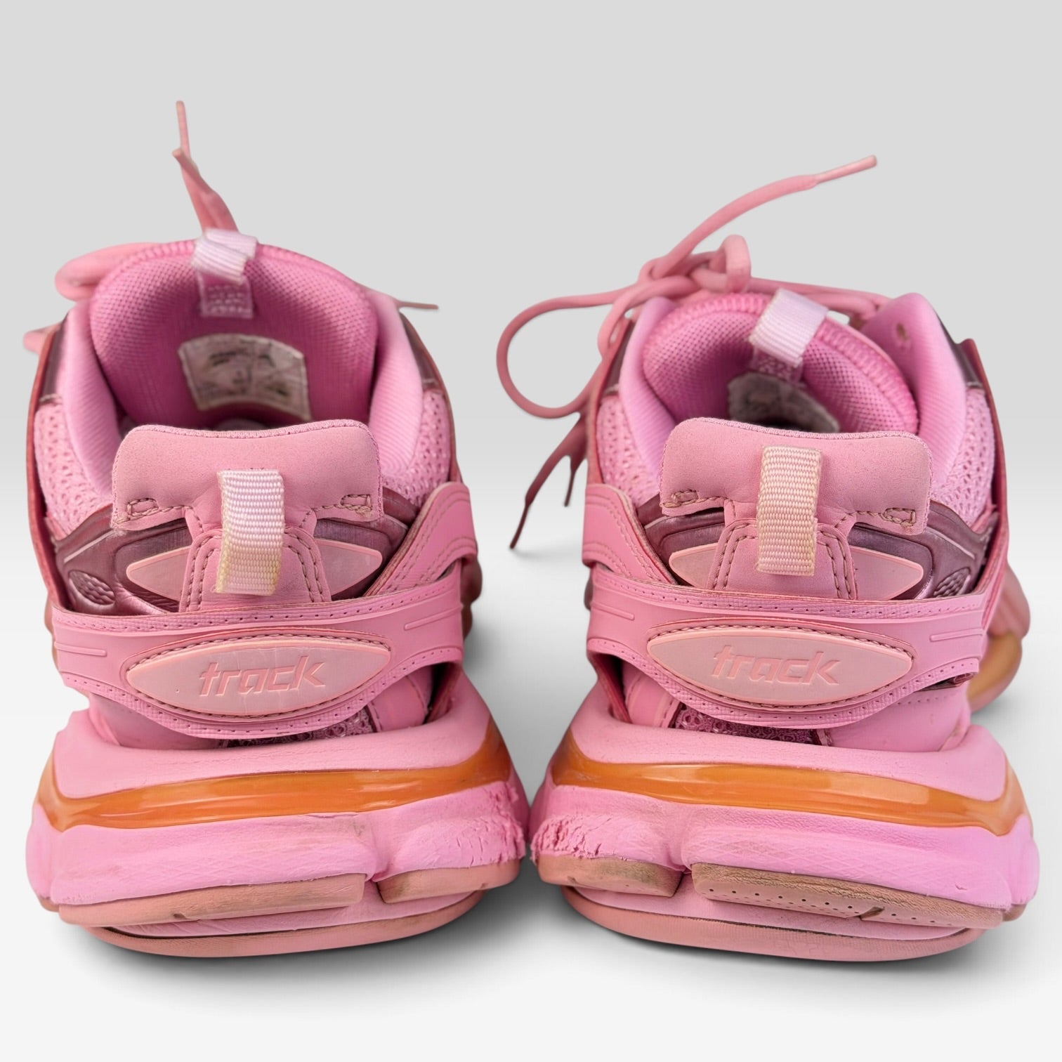 V STEALS Balenciaga Track sneakers in monochromatic pink with layered mesh and synthetic cage design, rear view