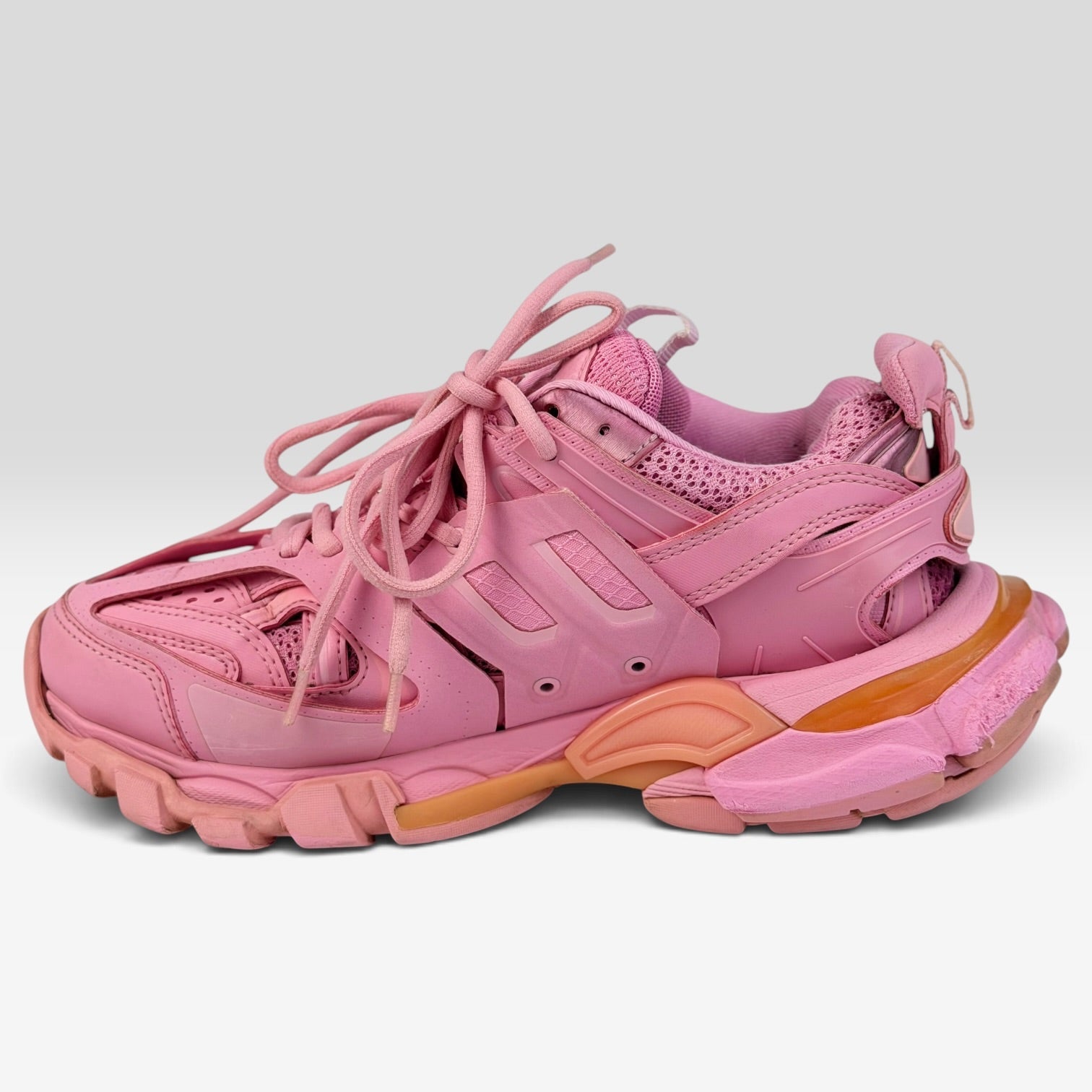 V STEALS Balenciaga Track sneakers in monochromatic pink featuring a multilayered synthetic and mesh design.