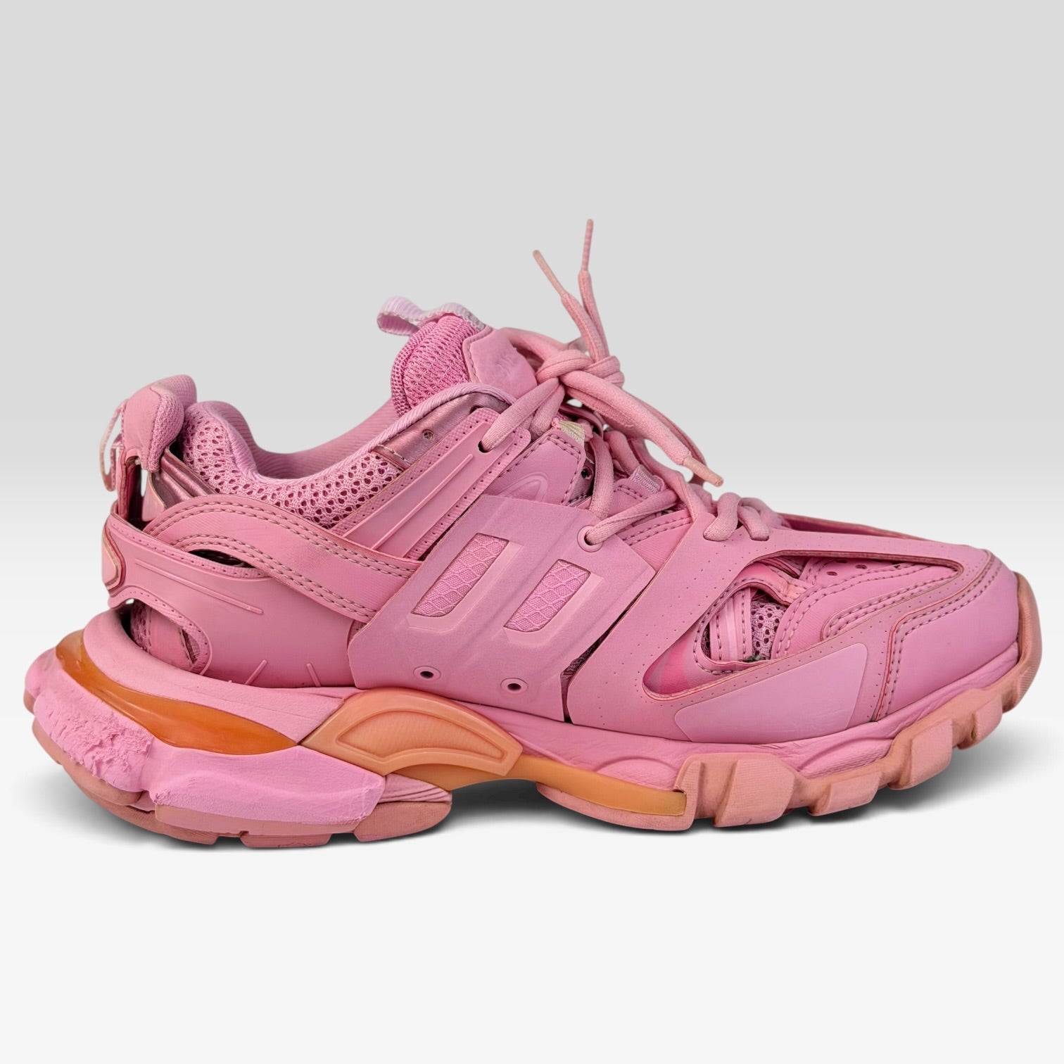 V STEALS Balenciaga Track sneakers in monochromatic pink featuring multilayer synthetic overlays and technical mesh.