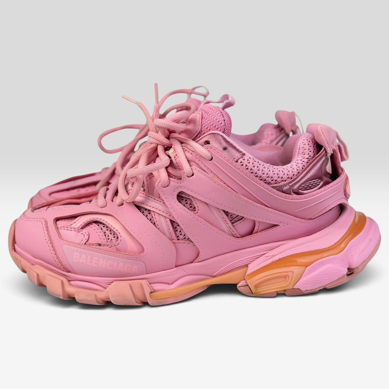V STEALS pre-loved Balenciaga Track sneakers in monochromatic pink with layered mesh and synthetic overlays.