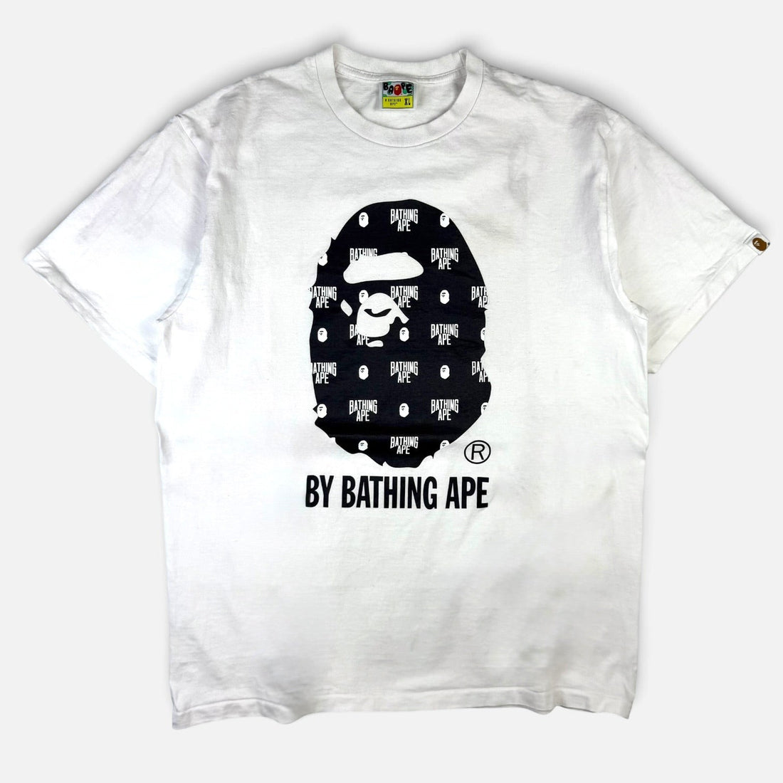 V STEALS white BAPE cotton t-shirt featuring a black Ape Head graphic with a repeating monogram pattern