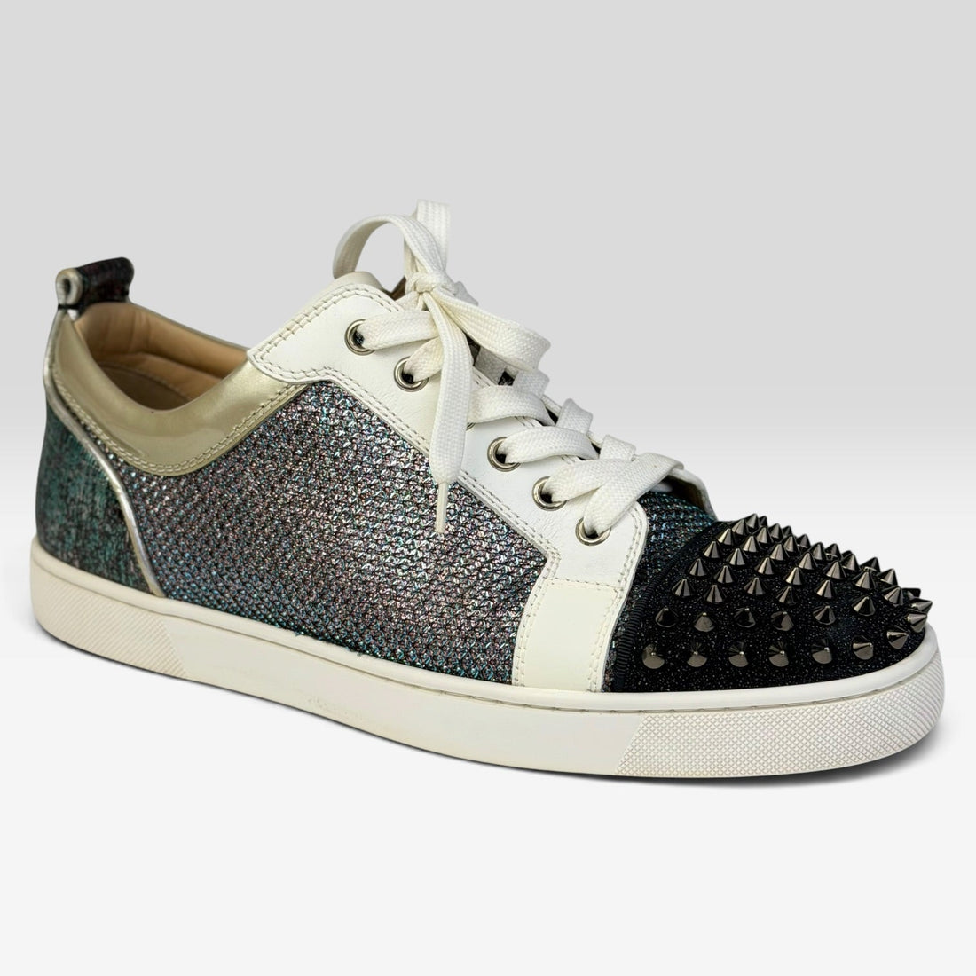 V STEALS Christian Louboutin Louis Junior sneakers with multicolor glitter, lizard-embossed leather, and silver spikes.