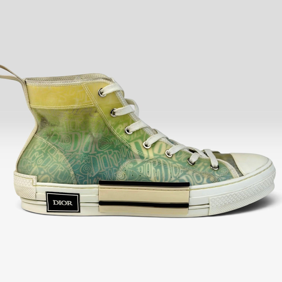 V STEALS Dior x Shawn Stussy B23 high-top sneakers in multicolor canvas with Oblique print and graphic lettering.