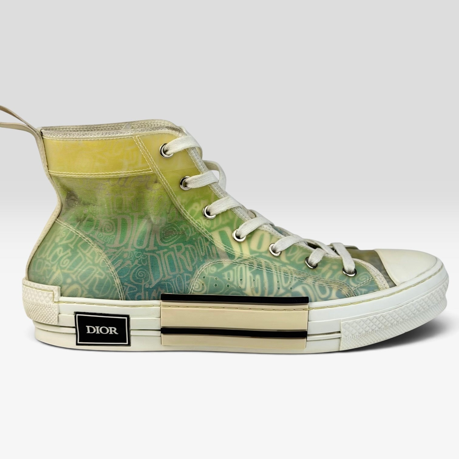 V STEALS Dior x Shawn Stussy B23 high-top sneakers in multicolor canvas with Oblique print and graphic lettering.