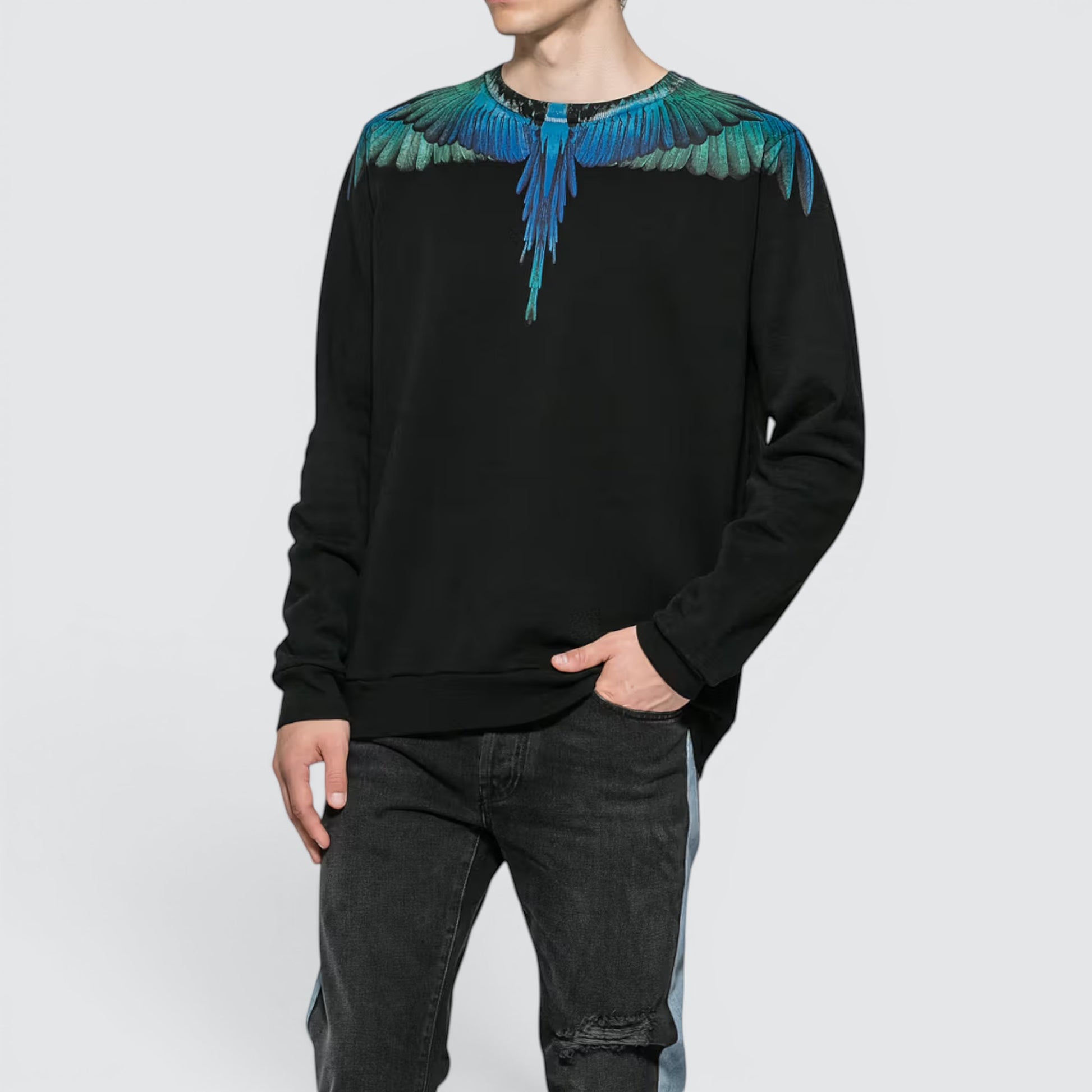 V STEALS Marcelo Burlon black crewneck sweatshirt featuring blue and teal bird wing graphic print on shoulders