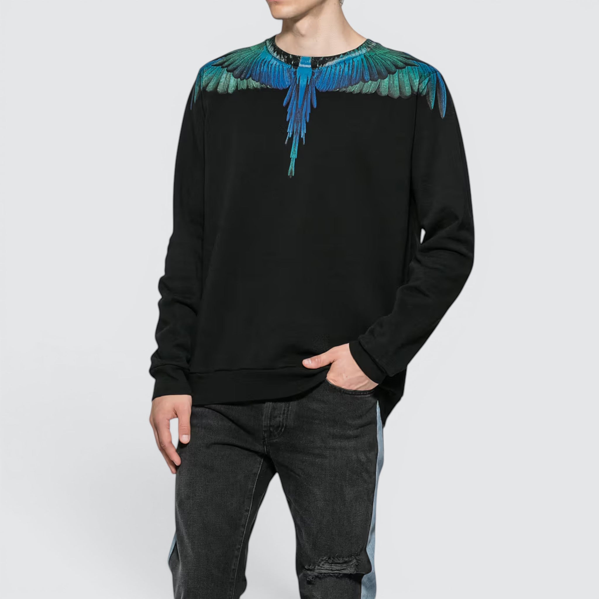 V STEALS Marcelo Burlon black crewneck sweatshirt featuring blue and teal bird wing graphic print on shoulders