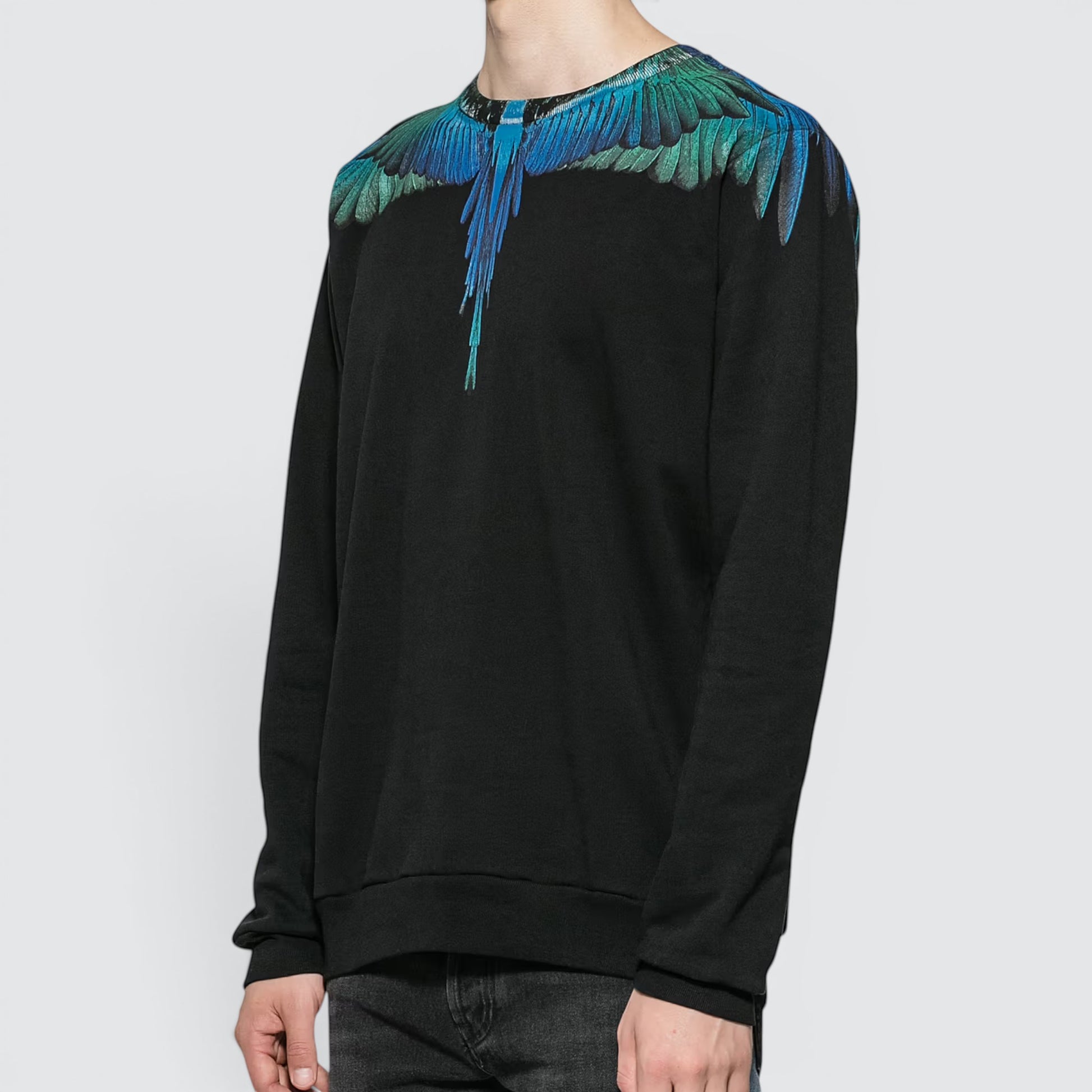 V STEALS Marcelo Burlon black cotton crewneck sweatshirt featuring iconic blue and teal wing graphic print on shoulders.
