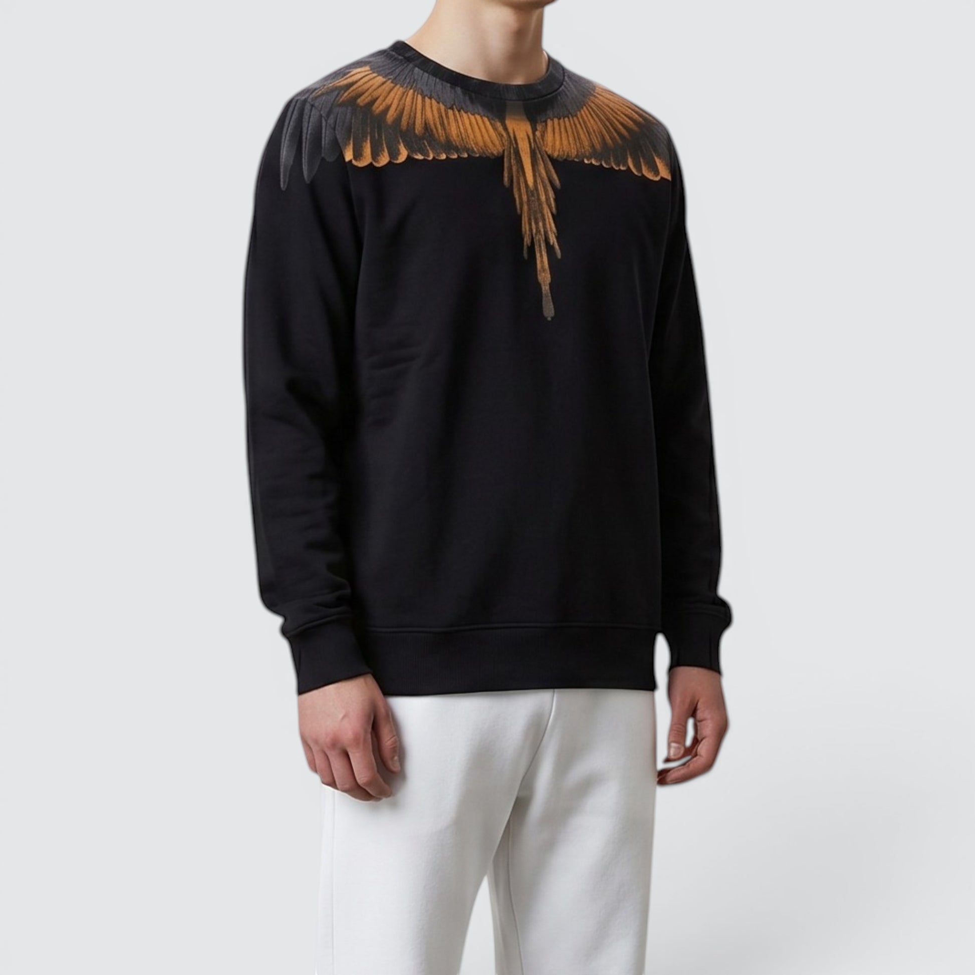 V STEALS Marcelo Burlon black cotton french terry sweatshirt featuring the signature orange and grey wings print.