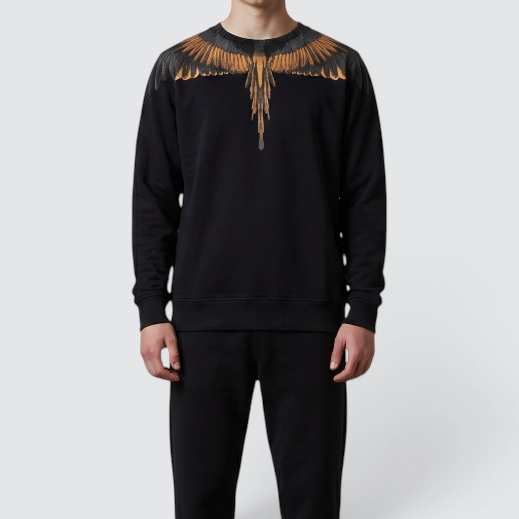 V STEALS Marcelo Burlon black french terry sweatshirt featuring the iconic orange and brown wings graphic print.