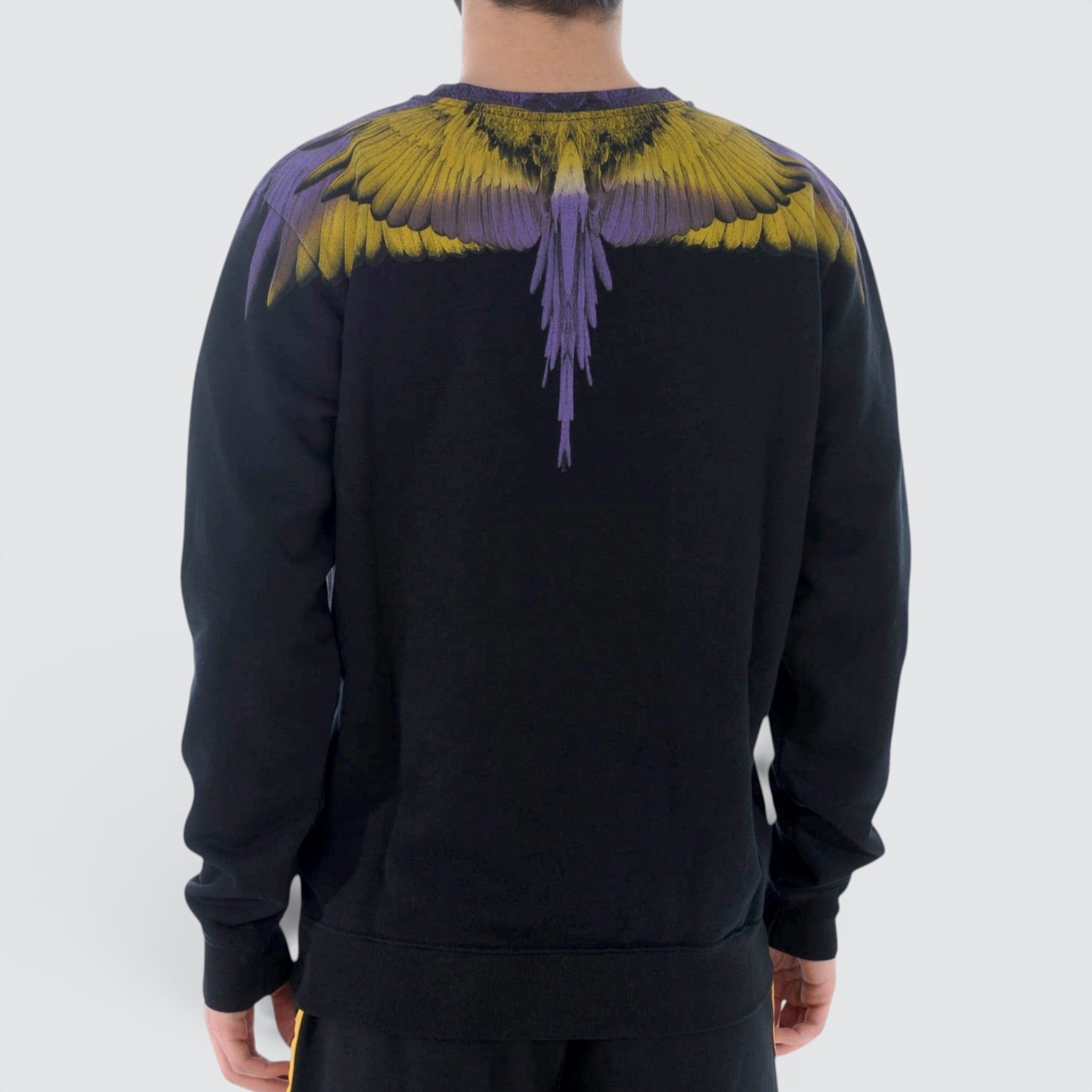 V STEALS Marcelo Burlon black cotton sweatshirt featuring iconic yellow and purple wings graphic print on the back