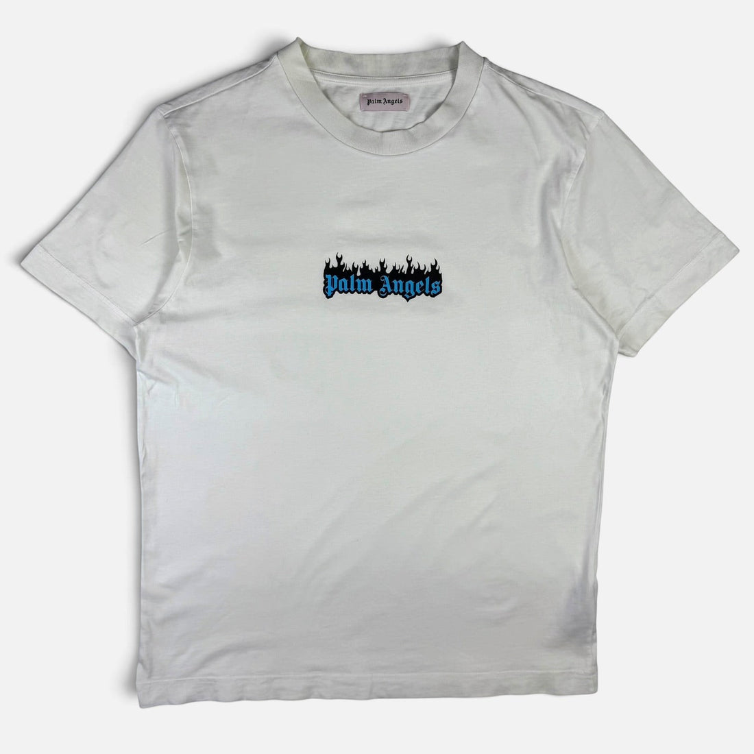 V STEALS white cotton t-shirt featuring a small blue Palm Angels gothic logo with black flames on the chest