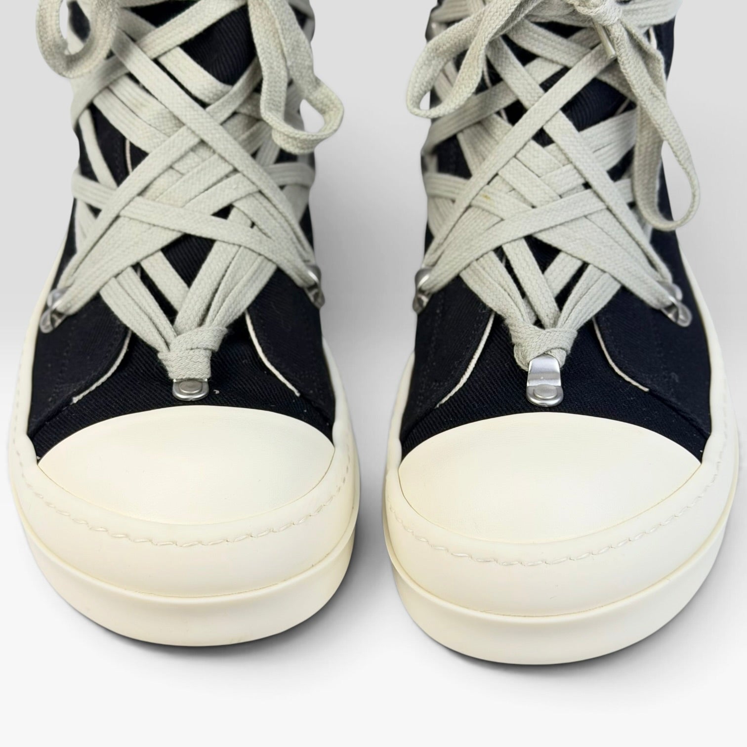 V STEALS Rick Owens DRKSHDW Hexagram Megalace high-top sneakers in black canvas with milk white toe caps and laces.
